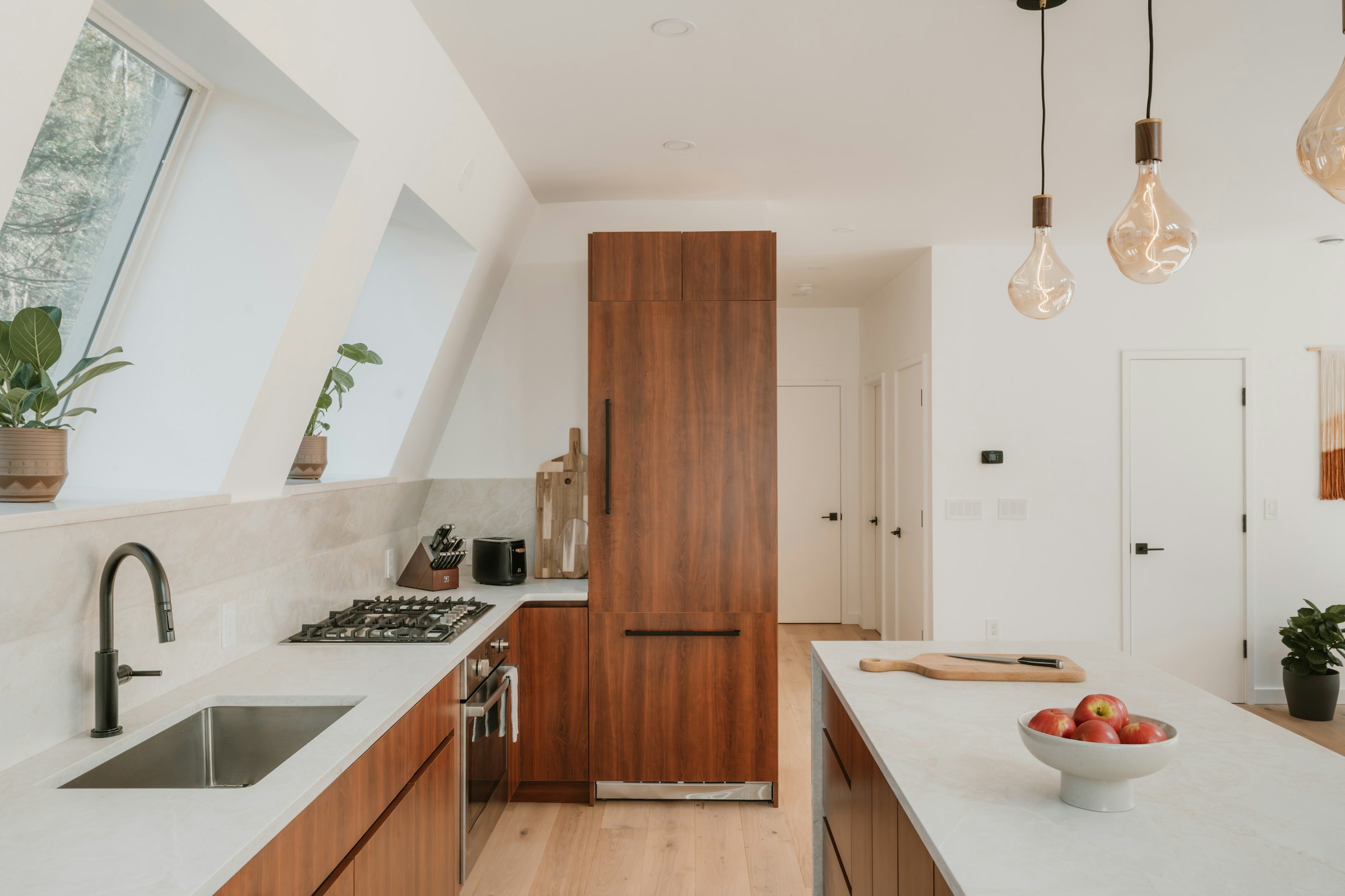 Custom fitted kitchen with wood cabinetry