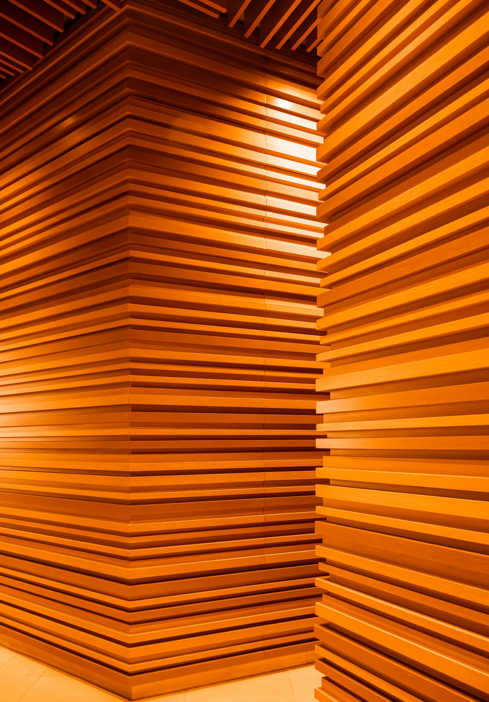 Dramatic wood slat wall installation