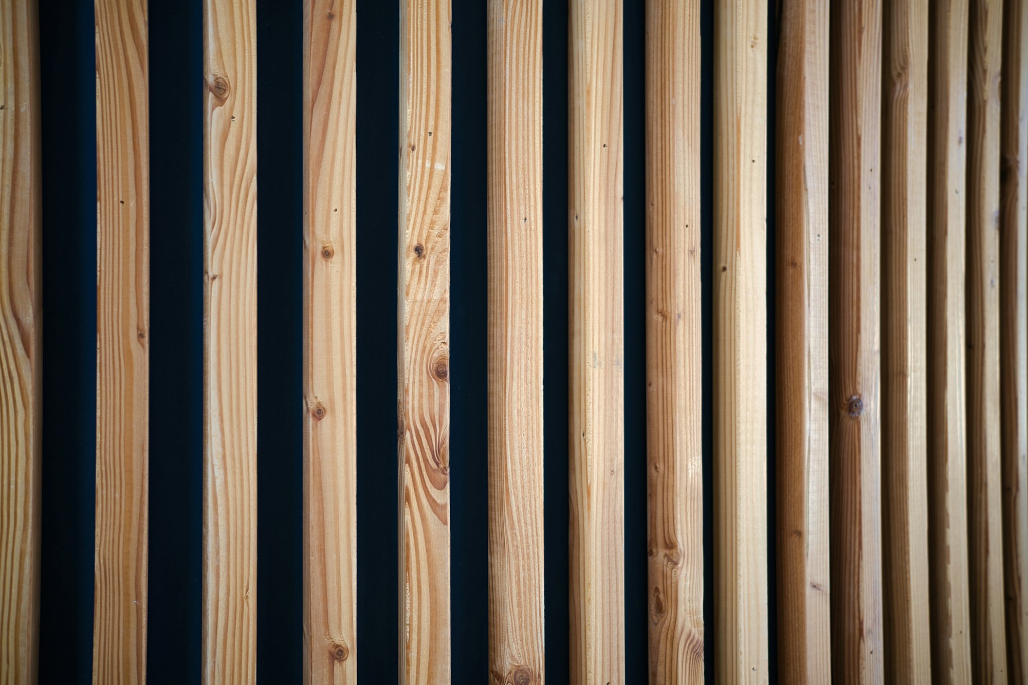 Vertical wood slat wall panelling